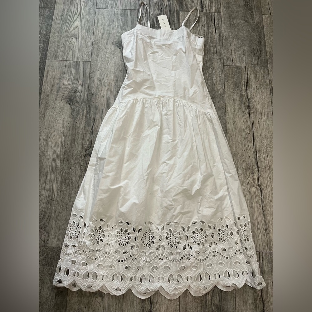 White Sleeveless Dress with Lace Hem